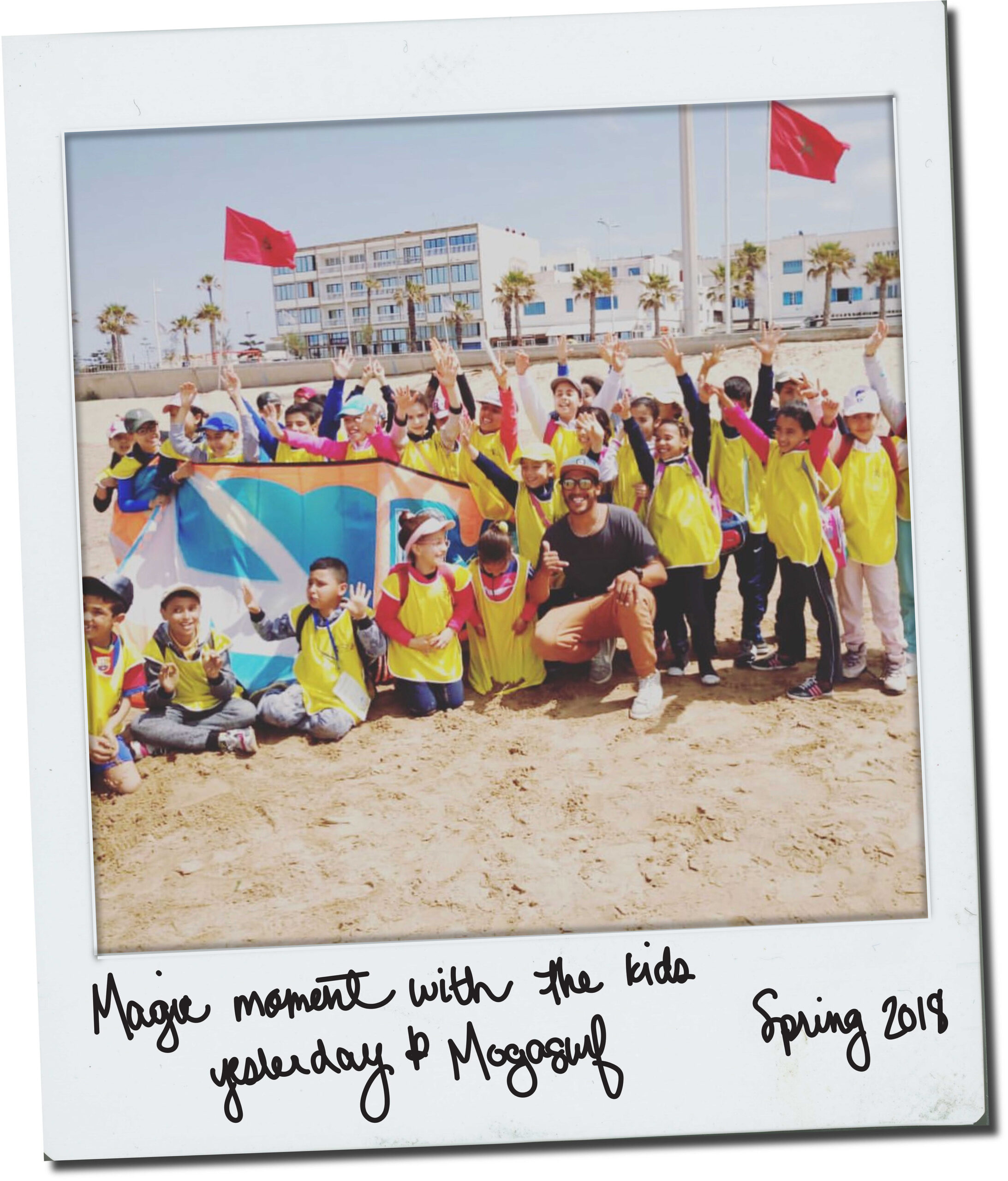 Ismail Adarzane volunteering with local kids on the beach of Essaouira, Morocco